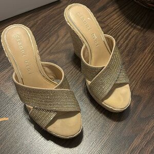 Shimmery slip on sandal.